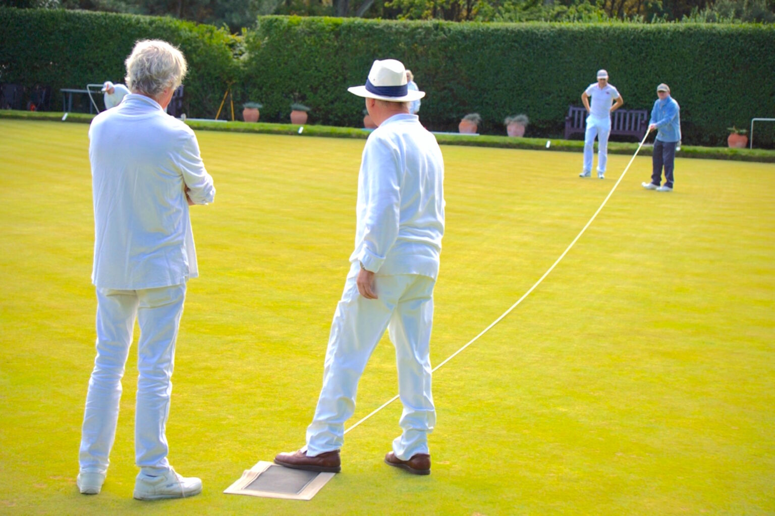 A minimum 23 metre measure is required from the edge of the mat to jack. If it is short the opposing team takes the jack.
